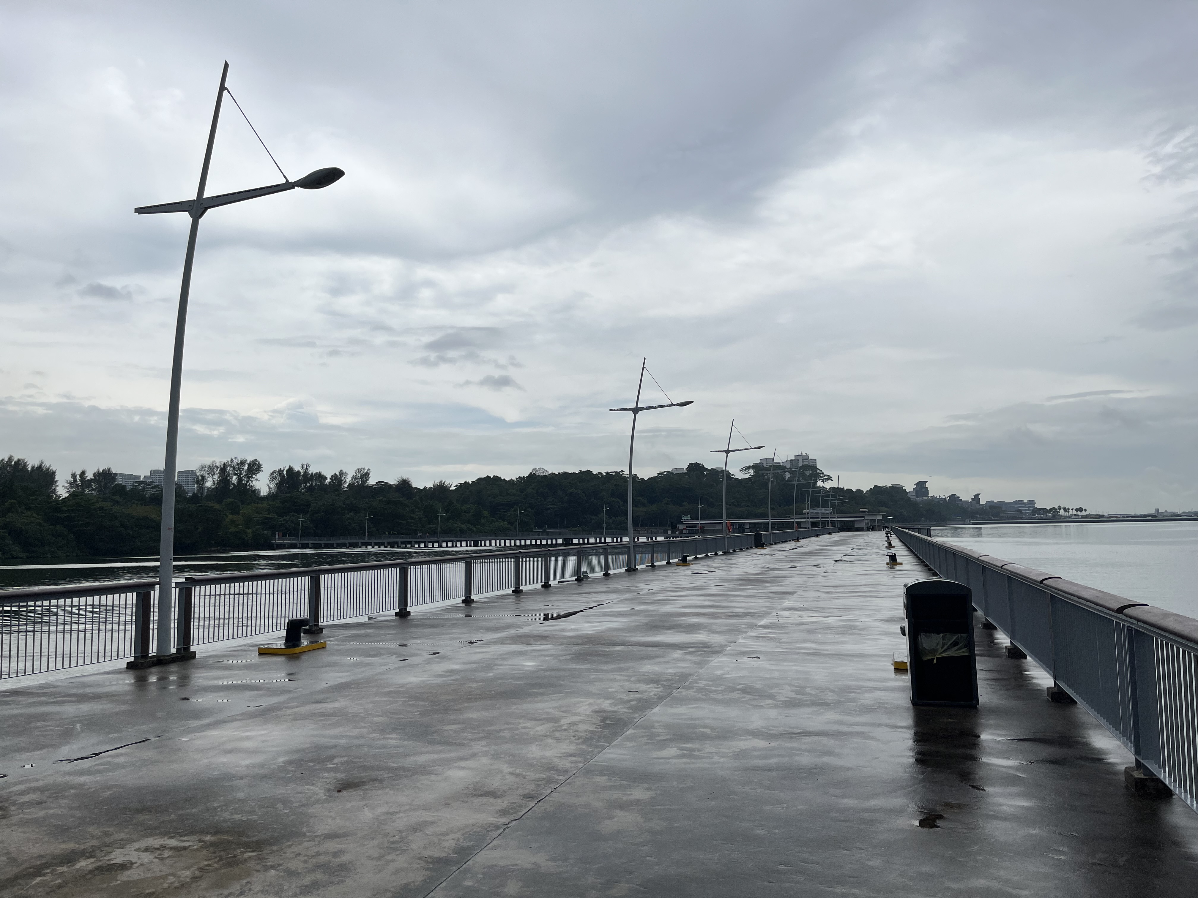 Small dog run overlooking the Johor Strait at Woodlands Waterfront Park